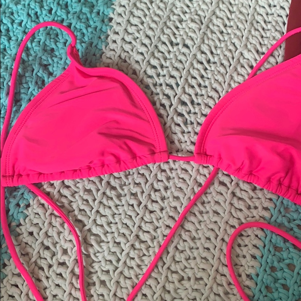 Neon pink bikin top in a size M